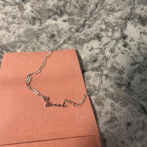 Customer photo, Cursive Name Necklace