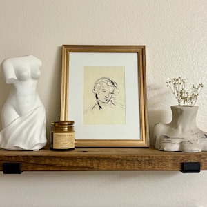 Katie added a photo of their purchase