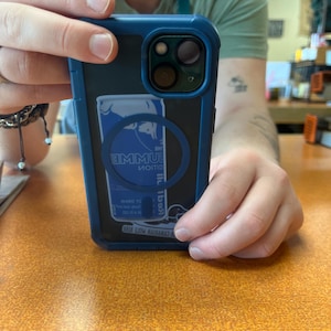 Alex added a photo of their purchase
