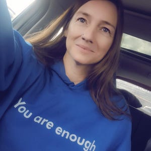 Sarah added a photo of their purchase