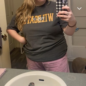 Tasha added a photo of their purchase