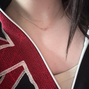 Customer photo, Paper Airplane Necklace