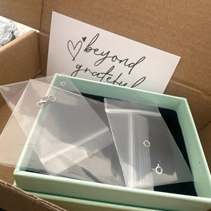 Cristina added a photo of their purchase
