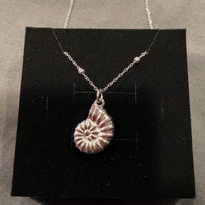 Review photo by Etsy buyer for Sea Snail Charm Necklace