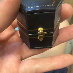 Adriana added a photo of their purchase