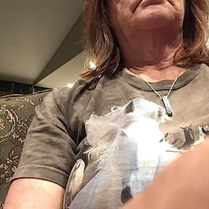 Sharon added a photo of their purchase