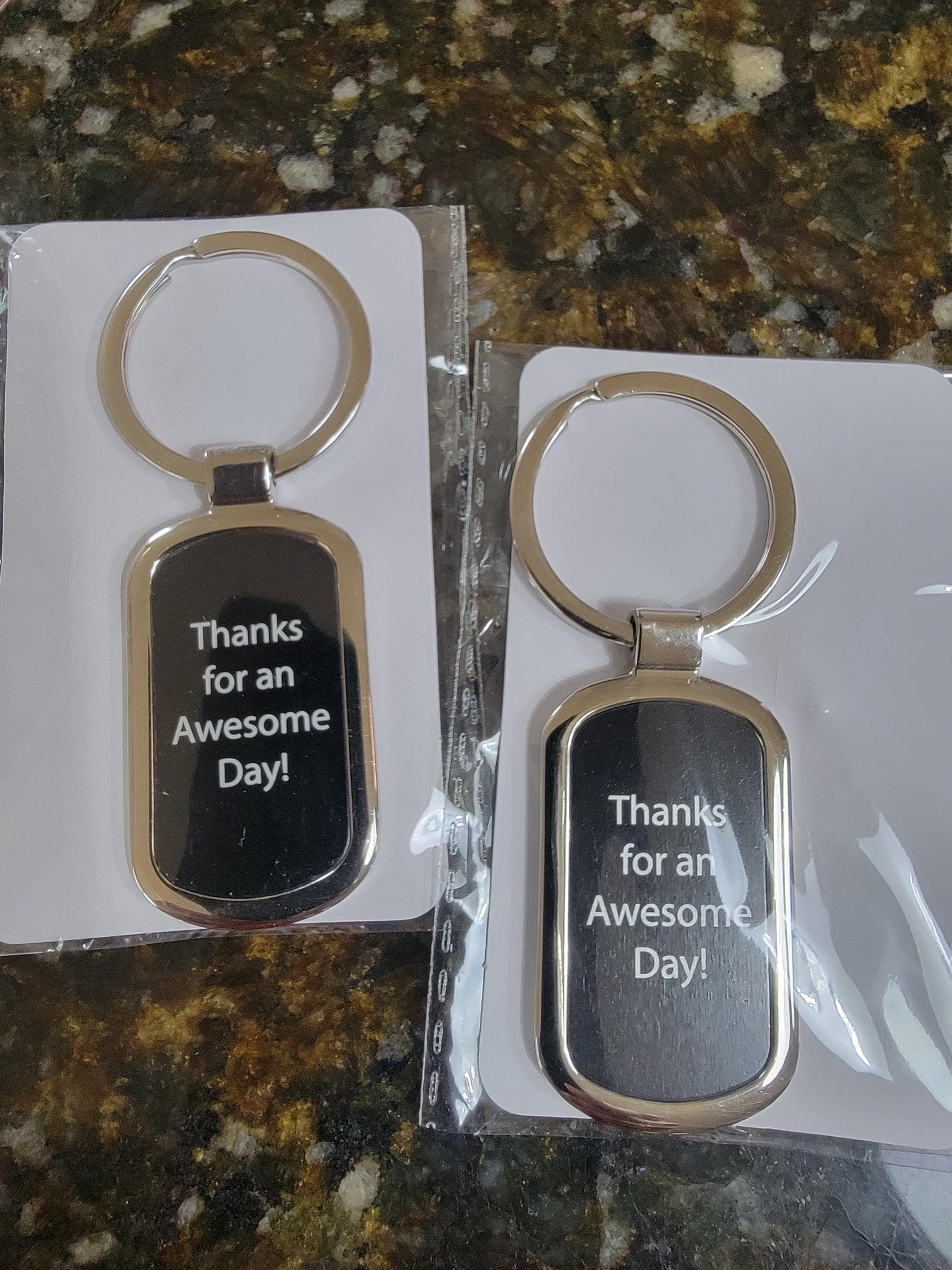 Customer photo of Custom Logo Etched Metal Keychain from Angela