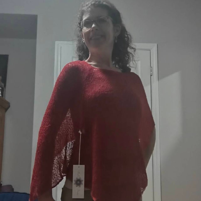 Eden wearing the cherry red Prema Poncho