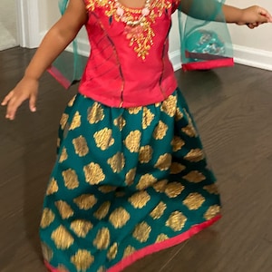 sandhya added a photo of their purchase