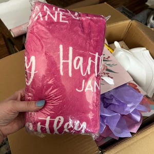 Denise added a photo of their purchase