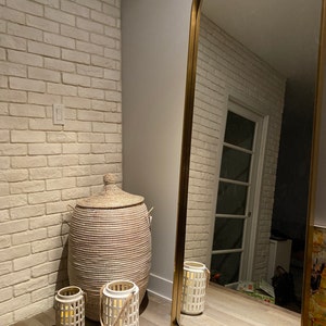 Adela added a photo of their purchase