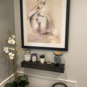 Deanna added a photo of their purchase