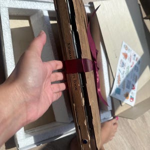 Larissa added a photo of their purchase