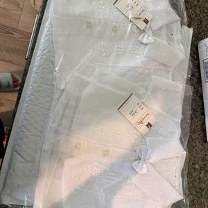 Nina added a photo of their purchase