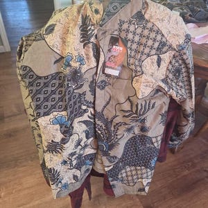 Russell added a photo of their purchase
