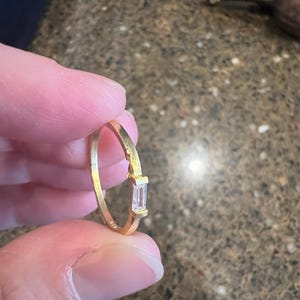 Sarah added a photo of their purchase