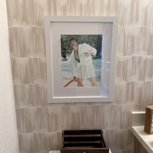 Alicia added a photo of their purchase