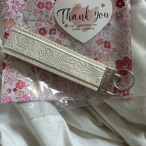 Davina added a photo of their purchase