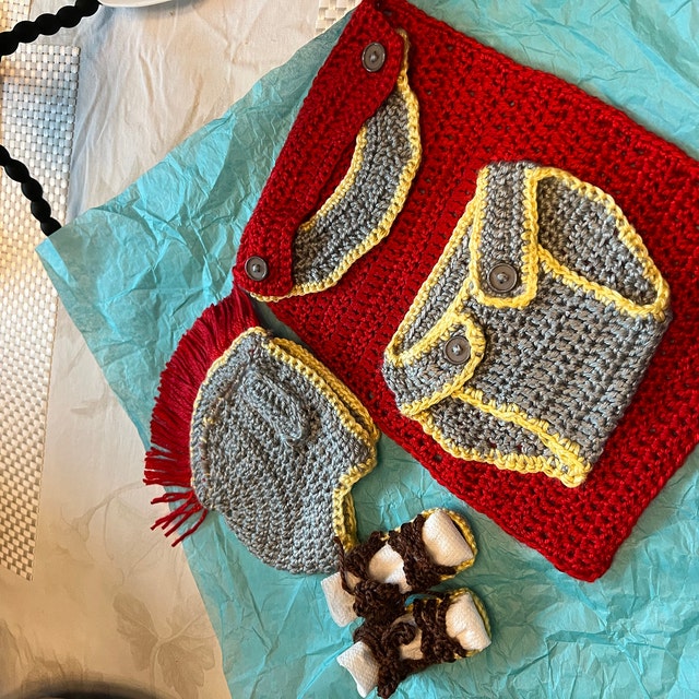 A customer's finished Baby Gladiator Outfit Crochet Pattern