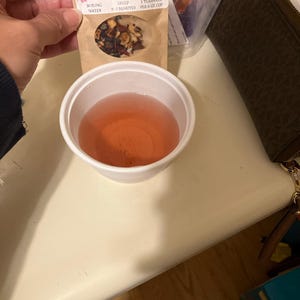 Naomi added a photo of their purchase