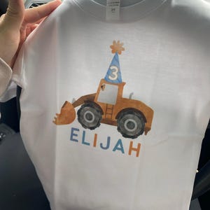 Sarah added a photo of their purchase