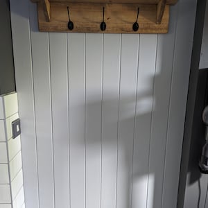 Lee lade till en bild av sitt köp