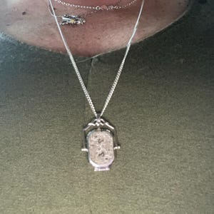 Helen added a photo of their purchase