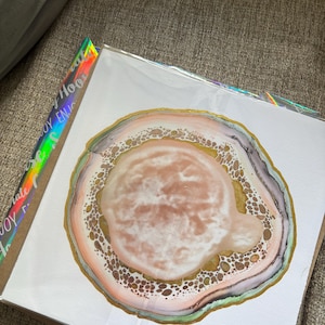 Elaine added a photo of their purchase