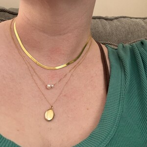 Christina added a photo of their purchase
