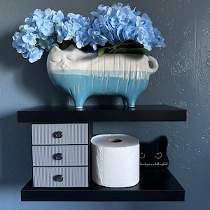 Laura added a photo of their purchase