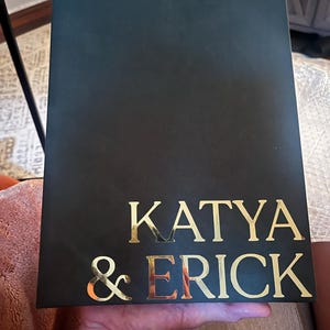 Katya added a photo of their purchase