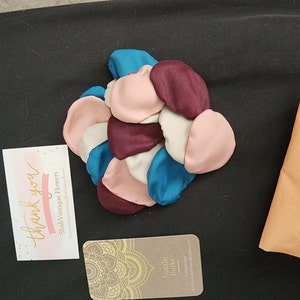 Aziza added a photo of their purchase