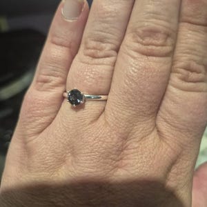 Rebecca added a photo of their purchase