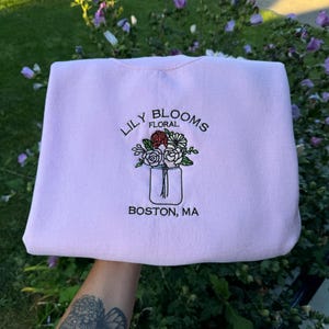 Sarah added a photo of their purchase