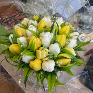 Elina added a photo of their purchase