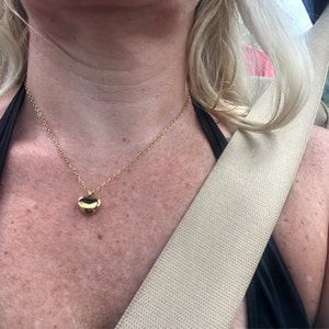 Angela added a photo of their purchase
