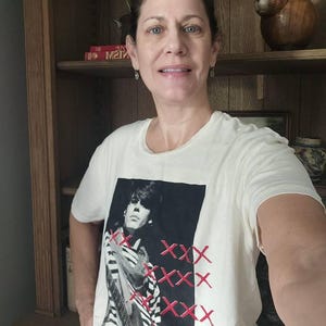 Joanna added a photo of their purchase