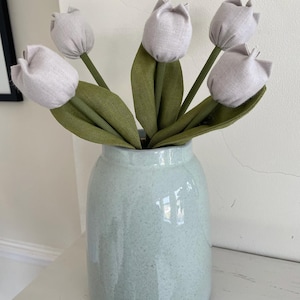 Aisha added a photo of their purchase