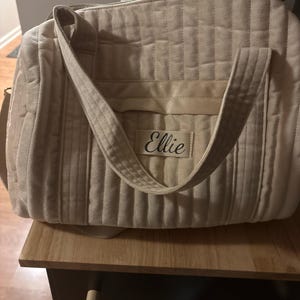 Brittany added a photo of their purchase