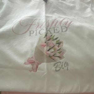 Ashley added a photo of their purchase