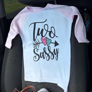 Ashley added a photo of their purchase