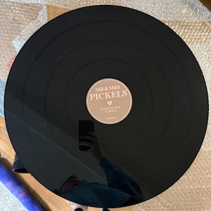 Taylor added a photo of their purchase