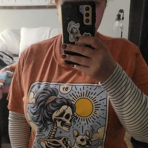 Sandra added a photo of their purchase