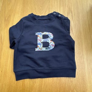 Katie added a photo of their purchase