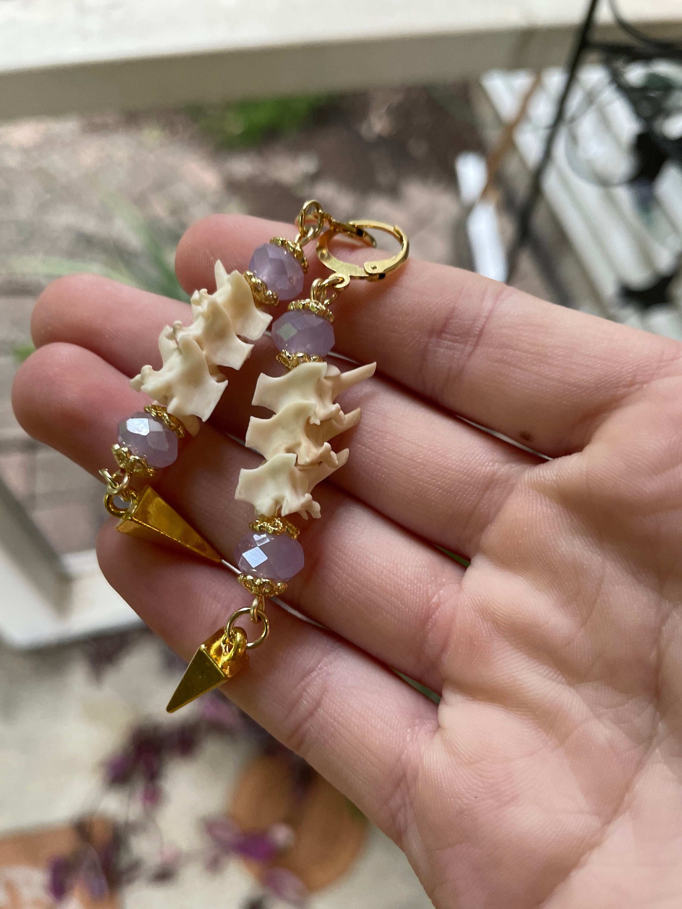 Exquisite Victorian-Era Inspired Coiled Rattlesnake Vertebrae Dangling, Earrings with Intricate Metalwork and Antique Brass Finish