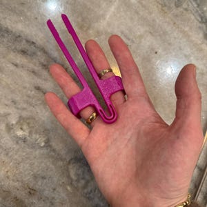 Alexandra added a photo of their purchase