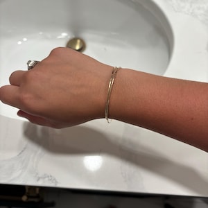 Elena added a photo of their purchase