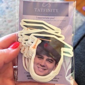 Sarah added a photo of their purchase
