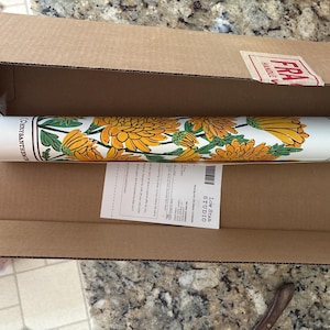 Louise added a photo of their purchase