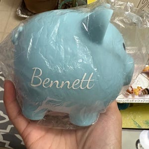 Aimee added a photo of their purchase